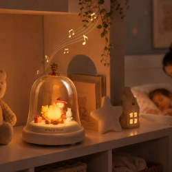 Lampka nocna świąteczna LED z ogniskiem pod kopułą i pozytywką