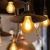Żarówka LED Filament Bursztynowa A60 E27 4W ciepła do salonu energiooszczędna