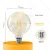 Żarówka LED Filament Bursztynowa G125 E27 8W 720lm 2200K Aigostar do przytulnego klimatu